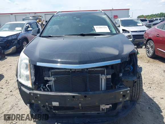 2015 Cadillac SRX Performance Collection with VIN 3GYFNCE30FS549872, listed as a IAAI auction lot 42201529 with 125,128 mi miles and . Bid and sale history available at DreamBid. Image 13.