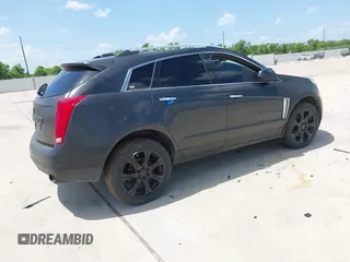 2015 Cadillac SRX Performance Collection with VIN 3GYFNCE31FS605298, listed as a IAAI auction lot 42859993 with 99,192 mi miles and . Bid and sale history available at DreamBid. Image 4.