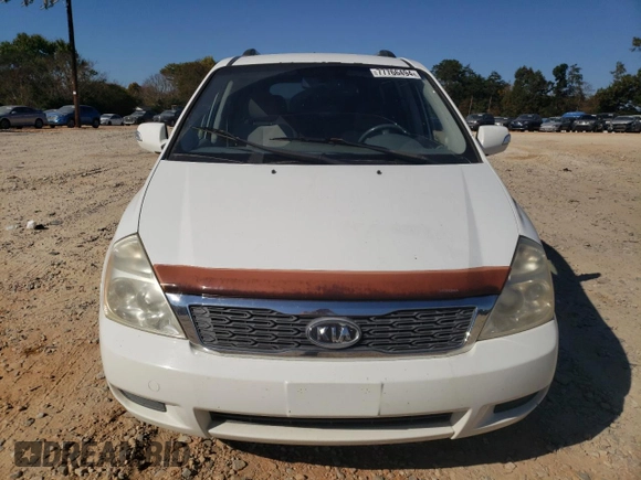 2011 Kia Sedona LX with VIN KNDMG4C76B6398313, listed as a Copart auction lot 77766494 with 244,988 mi miles and Salvage Title. Bid and sale history available at carsss.com. Image 5.
