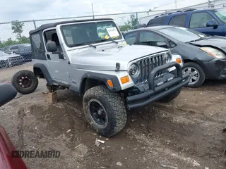 2004 Jeep Wrangler Sport with VIN 1J4FA49S44P772575, listed as a IAAI auction lot 42512876 with 226,387 mi miles and . Bid and sale history available at DreamBid. Image 1.