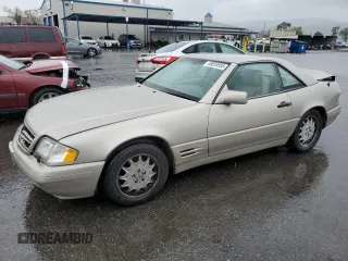 1996 Mercedes-Benz SL-Class with VIN WDBFA67FXTF133854, listed as a Copart auction lot 48659595 with 117,804 mi miles and Salvage Title. Bid and sale history available at carsss.com. Image 1.