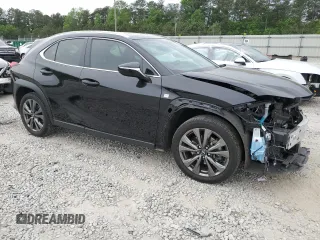 2021 Lexus UX 200 F Sport with VIN JTHE3JBHXM2033103, listed as a Copart auction lot 51348374 with 29,325 mi miles and . Bid and sale history available at DreamBid. Image 4.