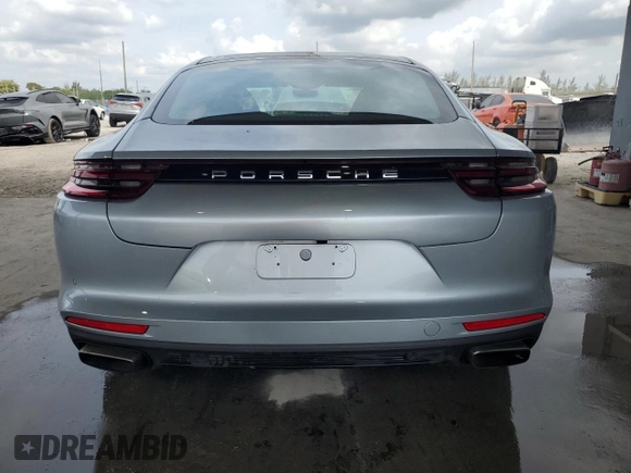 2018 Porsche Panamera z VIN WP0AA2A77JL102517, wystawiony jako Copart lot #52569245 z przebiegiem 64 314 mil mil oraz Czysty tytuł • Clean title. Historia ofert i sprzedaży dostępna na DreamBid. Obrazek 6.