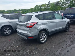 2018 Ford Escape SE with VIN 1FMCU9G99JUC41605, listed as a IAAI auction lot 39500946 with 114,032 mi miles. Bid and sale history available at carsss.com. Image 4.