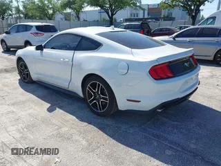 2021 Ford Mustang EcoBoost with VIN 1FA6P8TH6M5115299, listed as a IAAI auction lot 41972638 with 43,188 mi miles. Bid and sale history available at carsss.com. Image 3.