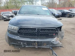 2015 Dodge Durango R/T with VIN 1C4SDJCT3FC156310, listed as a IAAI auction lot 42061041 with 99,621 mi miles and . Bid and sale history available at carsss.com. Image 12.