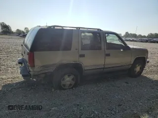 1999 GMC Yukon with VIN 1GKEK13R5XJ725991, listed as a Copart auction lot 71176784 with 245,481 mi miles and Clean Title. Bid and sale history available at carsss.com. Image 3.