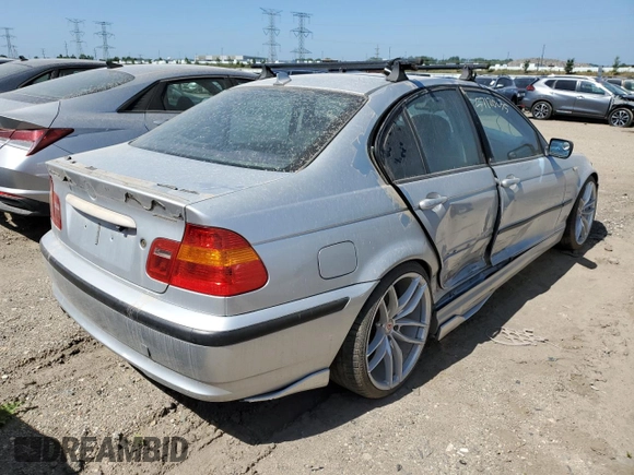 2004 BMW 3 Series 325xi with VIN WBAEU33404PM60151, listed as a Copart auction lot 57120235 with 116,859 mi miles and Salvage title. Bid and sale history available at DreamBid. Image 3.