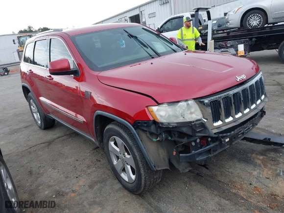 2011 Jeep Grand Cherokee Laredo with VIN 1J4RR4GT8BC636651, listed as a IAAI auction lot 41768944 with 200,160 mi miles. Bid and sale history available at carsss.com. Image 1.