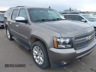 2014 Chevrolet Suburban LTZ with VIN 1GNSKKE77ER152503, listed as a IAAI auction lot 42105720 with 152,767 mi miles and . Bid and sale history available at DreamBid. Image 1.