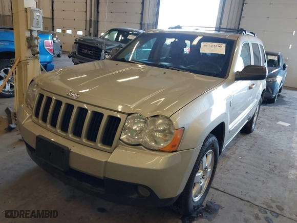 2010 Jeep Grand Cherokee Laredo with VIN 1J4RR4GT9AC106381, listed as a IAAI auction lot 41723268 with 180,008 mi miles. Bid and sale history available at carsss.com. Image 17.