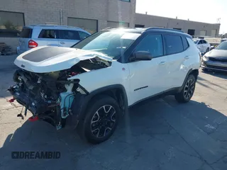 2020 Jeep Compass Trailhawk with VIN 3C4NJDDB4LT144129, listed as a IAAI auction lot 42582688 with 67,112 mi miles and . Bid and sale history available at DreamBid. Image 19.