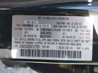 2013 Mazda CX-5 Grand Touring with VIN JM3KE4DE6D0127601, listed as a IAAI auction lot 42143558 with 95,719 mi miles and . Bid and sale history available at DreamBid. Image 9.