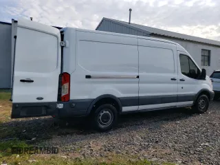 2016 Ford Transit Cargo with VIN 1FTYR2CM1GKA95802, listed as a Copart auction lot 67129054 with 69,590 mi miles and Salvage Title. Bid and sale history available at DreamBid. Image 3.