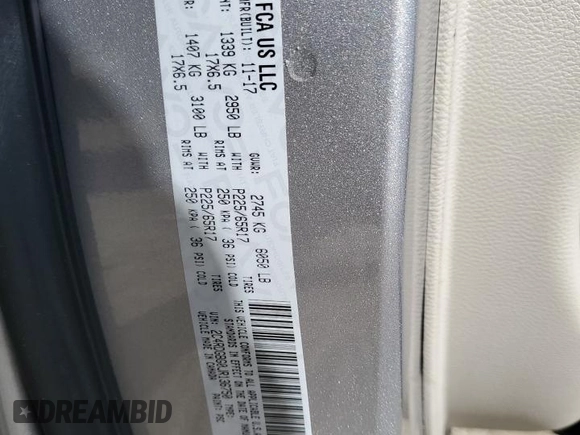 2018 Dodge Grand Caravan SE Plus with VIN 2C4RDGBG0JR136750, listed as a Copart auction lot 50957305 with 106,996 mi miles and Salvage Title. Bid and sale history available at DreamBid. Image 14.