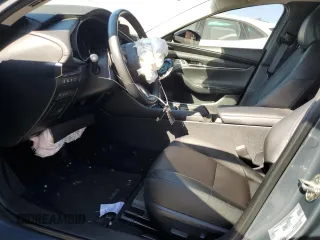 2023 Mazda 3 Premium Plus with VIN 3MZBPBEY5PM374977, listed as a Copart auction lot 70642804 with 9,029 mi miles and Salvage Title. Bid and sale history available at DreamBid. Image 7.