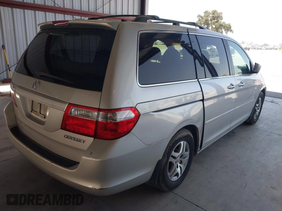 2005 Honda Odyssey EX-L with VIN 5FNRL38705B106488, listed as a IAAI auction lot 42545141 with 199,619 mi miles and . Bid and sale history available at DreamBid. Image 4.