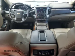 2015 Chevrolet Suburban LTZ with VIN 1GNSKKKC0FR130023, listed as a Copart auction lot 46630825 with 140,057 mi miles and Salvage Title. Bid and sale history available at carsss.com. Image 8.