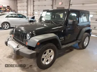 2007 Jeep Wrangler X with VIN 1J8FA24167L230763, listed as a IAAI auction lot 41876090 with 130,136 mi miles and . Bid and sale history available at carsss.com. Image 17.