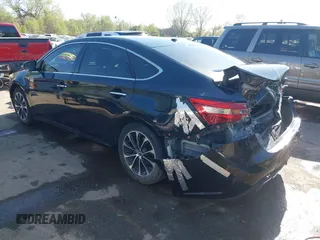 2016 Toyota Avalon Limited with VIN 4T1BK1EB3GU202817, listed as a IAAI auction lot 42023194 with 86,979 mi miles and . Bid and sale history available at carsss.com. Image 3.