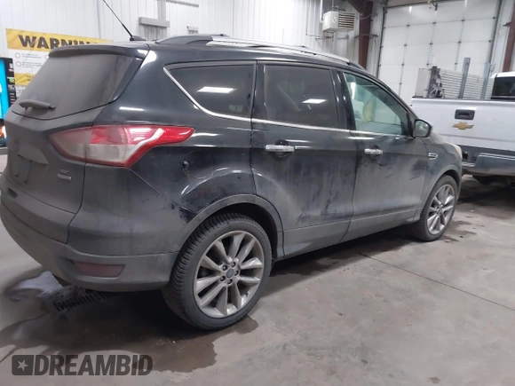 2014 Ford Escape SE with VIN 1FMCU9GXXEUD09124, listed as a IAAI auction lot 41747925 with 147,996 mi miles and . Bid and sale history available at DreamBid. Image 4.