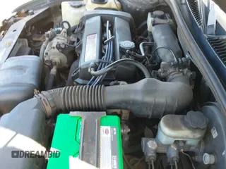 1999 Saturn SL z VIN 1G8ZK5274XZ351289, wystawiony jako IAAI lot #41734679 z przebiegiem 140 006 mil mil oraz . Historia ofert i sprzedaży dostępna na DreamBid. Obrazek 12.