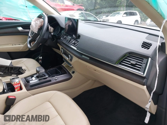 2022 Audi Q5 S line Premium z VIN WA1GAAFY2N2094208, wystawiony jako IAAI lot #42672467 z przebiegiem 26 301 mil mil oraz . Historia ofert i sprzedaży dostępna na DreamBid. Obrazek 5.