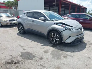 2019 Toyota C-HR XLE with VIN NMTKHMBX8KR093044, listed as a IAAI auction lot 41939036 with 60,130 mi miles. Bid and sale history available at carsss.com. Image 1.