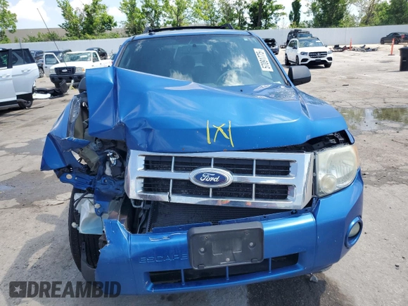 2011 Ford Escape XLT с VIN 1FMCU9D7XBKA27058, выставлен на аукционе Copart как лот 57091775 с пробегом 207 378 миль миль и Списание • Salvage title. История ставок и продаж доступна на DreamBid. Изображение 5.