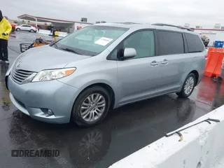 2011 Toyota Sienna XLE AAS with VIN 5TDYK3DC5BS111467, listed as a IAAI auction lot 41560895 with 126,917 mi miles. Bid and sale history available at carsss.com. Image 2.