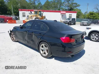 2013 BMW 3 Series 328i with VIN WBA3C1C57DF434854, listed as a IAAI auction lot 42023257 with 125,960 mi miles and . Bid and sale history available at carsss.com. Image 3.