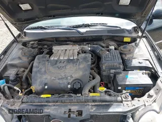 2004 Hyundai Sonata GLS with VIN KMHWF35H24A959811, listed as a IAAI auction lot 42145988 with 206,487 mi miles. Bid and sale history available at carsss.com. Image 10.