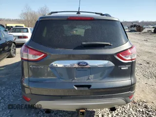 2016 Ford Escape Titanium with VIN 1FMCU9J97GUC18874, listed as a Copart auction lot 48399245 with 138,133 mi miles and Salvage Title. Bid and sale history available at DreamBid. Image 6.