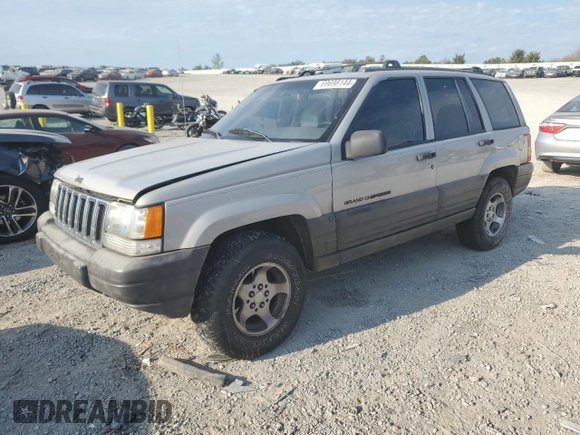 1998 Jeep Grand Cherokee Laredo with VIN 1J4GZ58S8WC301754, listed as a Copart auction lot 69698144 with 205,739 mi miles and Non Repairable. Bid and sale history available at carsss.com. Image 1.
