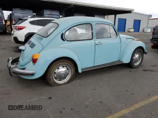 1973 Volkswagen Beetle with VIN 1332743225, listed as a Copart auction lot 82205824 with 66,942 mi miles and Clean Title. Bid and sale history available at DreamBid. Image 3.
