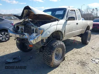 1996 Toyota Tacoma with VIN 4TAWN72N8TZ143884, listed as a IAAI auction lot 41679794 with 88,676 mi miles and . Bid and sale history available at DreamBid. Image 2.