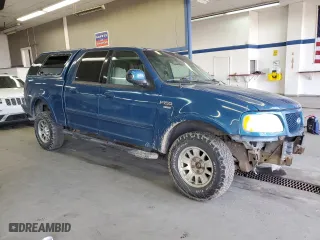 2001 Ford F-150 SuperCrew XLT with VIN 1FTRW08LX1KE90912, listed as a Copart auction lot 48596235 with 282,953 mi miles and Salvage Title. Bid and sale history available at carsss.com. Image 4.