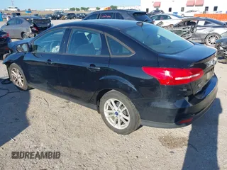 2018 Ford Focus SE with VIN 1FADP3F25JL222689, listed as a IAAI auction lot 42208219 with 127,875 mi miles and . Bid and sale history available at DreamBid. Image 3.