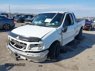 1999 Ford F-150 XL with VIN 1FTRX17L0XKB96416, listed as a IAAI auction lot 41333031 with Not Provided miles. Bid and sale history available at carsss.com. Image 18.