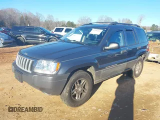 2004 Jeep Grand Cherokee Laredo z VIN 1J4GW48S24C159370, wystawiony jako IAAI lot #41296094 z przebiegiem 138 296 mil mil oraz . Historia ofert i sprzedaży dostępna na DreamBid. Obrazek 2.