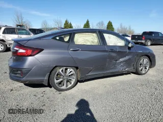 2018 Honda Clarity with VIN JHMZC5F17JC005285, listed as a Copart auction lot 50688495 with 56,521 mi miles and Salvage Title. Bid and sale history available at DreamBid. Image 3.
