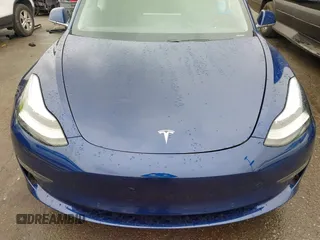 2020 Tesla Model 3 Standard Range Plus with VIN 5YJ3E1EAXLF644679, listed as a IAAI auction lot 41500595 with 53,726 mi miles and . Bid and sale history available at DreamBid. Image 10.