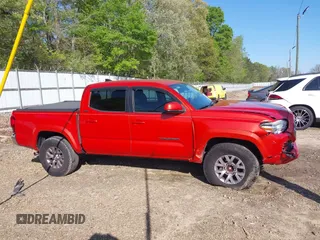 2018 Toyota Tacoma SR5 with VIN 5TFAZ5CN2JX069067, listed as a IAAI auction lot 41975459 with 92,434 mi miles and . Bid and sale history available at DreamBid. Image 13.
