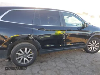 2021 Honda Pilot EX-L with VIN 5FNYF5H51MB004516, listed as a IAAI auction lot 41759992 with 75,476 mi miles. Bid and sale history available at carsss.com. Image 14.