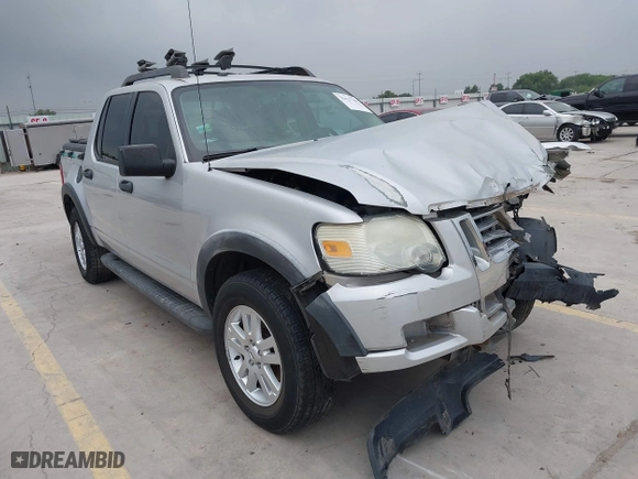 2010 Ford Explorer Sport Trac XLT with VIN 1FMEU5BE6AUF06535, listed as a IAAI auction lot 39427769 with 142,114 mi miles. Bid and sale history available at carsss.com. Image 1.