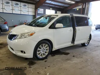 2014 Toyota Sienna LE with VIN 5TDJK3DC5ES090576, listed as a Copart auction lot 46333725 with 201,860 mi miles and Clean Title. Bid and sale history available at DreamBid. Image 1.