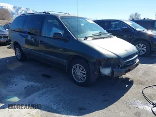 2000 Dodge Caravan SE with VIN 1B4GP44R7YB640326, listed as a IAAI auction lot 41680410 with 213,009 mi miles. Bid and sale history available at carsss.com. Image 1.