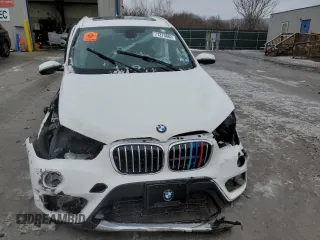 2018 BMW X1 xDrive28i with VIN WBXHT3C3XJ5K32369, listed as a Copart auction lot 71373882 with 0 mi miles. Bid and sale history available at carsss.com. Image 5.