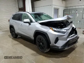 2022 Toyota RAV4 Hybrid SE with VIN JTM16RFVXND052911, listed as a Copart auction lot 62829175 with 84,035 mi miles and Salvage title. Bid and sale history available at DreamBid. Image 4.
