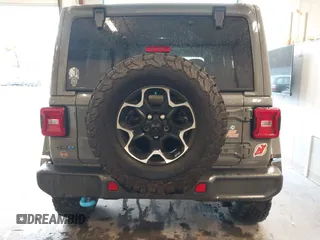 2021 Jeep Wrangler Unlimited Rubicon z VIN 1C4JJXR65MW675010, wystawiony jako IAAI lot #41990021 z przebiegiem 73 406 mil mil oraz . Historia ofert i sprzedaży dostępna na DreamBid. Obrazek 16.